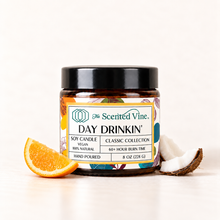 Load image into Gallery viewer, Day Drinkin' Soy Candle with small citrus wedge and coconut piece