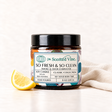 Load image into Gallery viewer, So Fresh &amp; So Clean Candle (Smoke and Odor Eliminator) Soy Candle with a small lemon wedge and a subtle fold of off-white linen